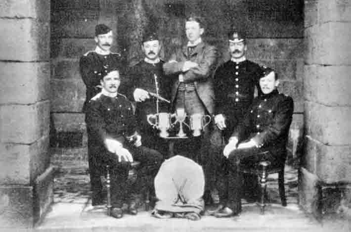 Members of the Northants Regiment with pistol shooting trophies in 1895