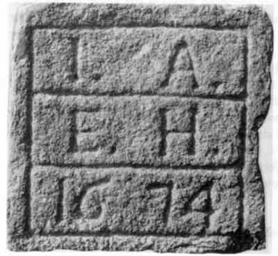 A 1674 datestone referring to Josue Ahier and Elizabeth Hamptonne