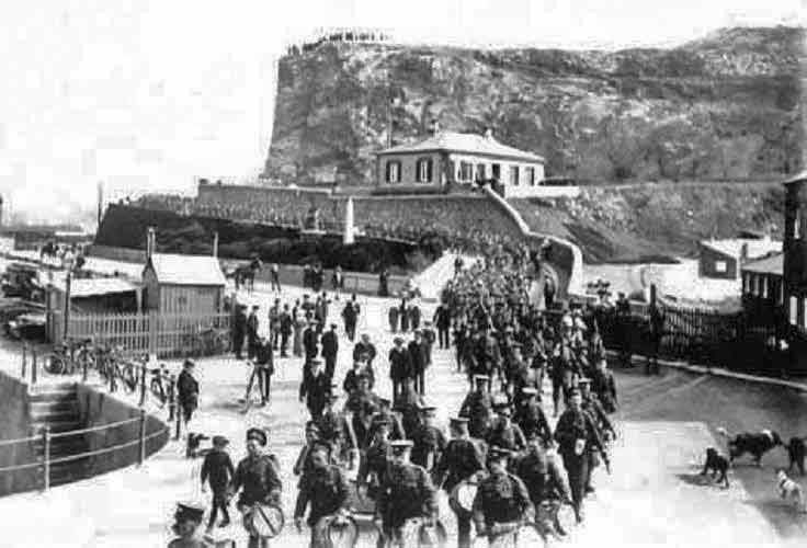 The 1st Devonshire Regiment on their way to depart the island