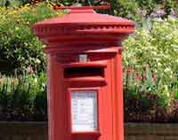 The one in the Parade has the remains of a sign holder on top. On the mainland these signs pointed to the nearest post office