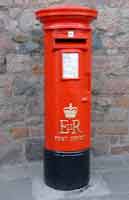In the reign of Elizabeth II the pillar box is once again affordable, and here's a classic design nicely painted (Green Street). Others are found in the Parade (Elizabeth Place end), nearby inside the Hospital reception area, at Maufant Co-op, Grands Vaux shops, Quennevais estate, St Peter's Co-op, St Ouen shops, and Sandybrook