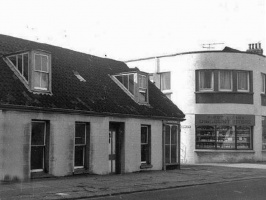 1975: the former Le Huquet's hairdressers with First Tower Discount Store behind