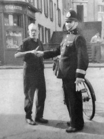 An unnamed policeman at Snow Hill with chimney sweep Tom Channing