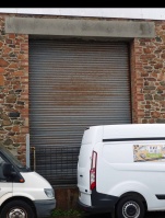 A metal grill hides the old steps