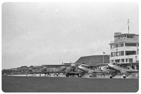 Jersey Airways aircraft line abreast on the apron in 1937 ...