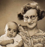 Iris May Nicolle with one of her five children, probably Garnet Harold