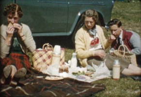 A family picnic captured on an early colour cine film
