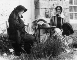 Betty Bois and Eileen Le Sueur wearing and making Jersey bonnets