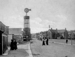 First Tower with the windmill seen from St Aubin's Road