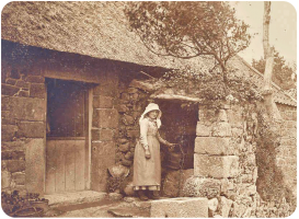 Miss Stark at the well, Les Hougues Farm, now called L`Abri, Route des Côtes du Nord, Trinity