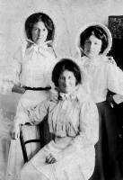 A family wearing Jersey bonnets