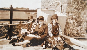 An alfresco lunch with a glass of beer for three ladies at Mont Orgueil Castle in the 1920s