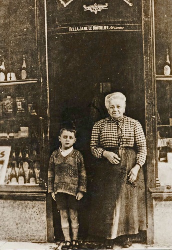 Bella Jane Le Boutillier, nee Asplet, widow of Captain Francois Le Boutillier, outside her shop at 9 Aquila Road