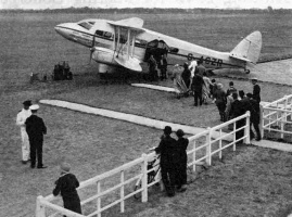 Passengers board DH 86 La Saline Bay at Heston