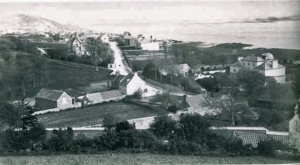 An early photograph of Millbrook before the sea wall was built and railway track laid, which dates it before 1870