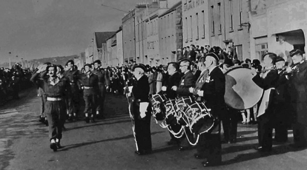 Major Sargent lead his men in a victory parade ...
