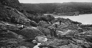 Crossing the rocks to the caves
