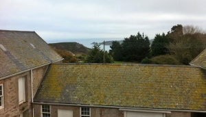 The view of Bouley Bay over the outbuildings from the upper storey of the house