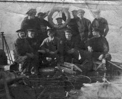 Walter Henry de Caen and shipmates on HMS Arcadia. He enlisted in 1895 and was a Petty Officer, 1st Class on HMS Monarch in the Battle of Jutland, and then lost his life when HMS Arcadia sank in 1918