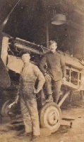 Mechanic Walter Le Quesne on the wheel of a SE5 in 1917