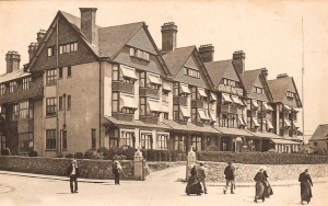 Breton workers pass the Grand Hotel on their way to a day out in town