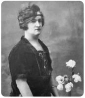 Caroline Eldora Honora Blanche Harris (1881-1968), born in St Helier and married to Ernest Benest (1874-1928). They had seven children. Two years after Ernest died, Caroline, who was an accomplished opera singer, married again, to Garnet Francis Mabey (1894- )