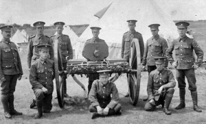 Militia members with Maxim Gun