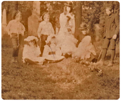 The Le Dain family visit a family grave