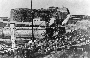 Loading potato barrels on the Victoria Pier