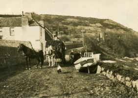 Vraic covers the road after a storm