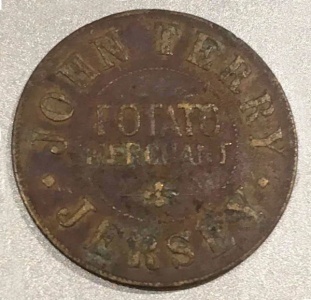A token issued to farmers by potato merchants John Terry ...