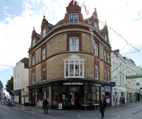 A view of the whole corner property. Coffee Republic occupies No 45 and Jessops, the final bay on the right, facing King Street