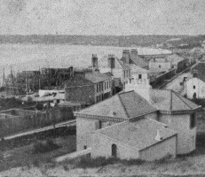 St Aubin's Road at First Tower showing shipyards on the left. Photograph by William Slater