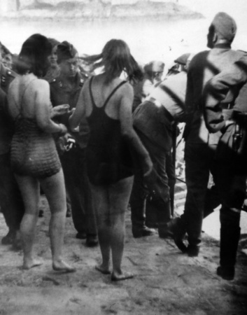 A photograph of 'Jerrybags', showing Jersey girls mixing with German soldiers at Havre des Pas Pool.