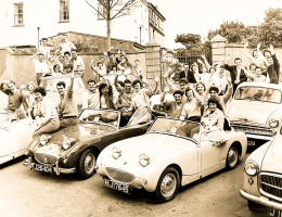 Honeymooners with their hire cars in 1961
