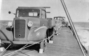 A commandeered lorry and other vehicles en route to Granville