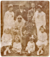 1919 wedding of Mabel Louise Sarah Baker and Henry Perry, with Mabel's father Horatio Pitter Baker behind her