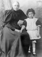 Christiana Taylor, born in St Helier in 1818, the daughter of John and Ann, nee Courtice. She married Philip Langworthy (1818-1905) of Devon and they moved back to Jersey, where they had four daughters. She is pictured in about 1896 with her youngest grandchild Charles Mauger