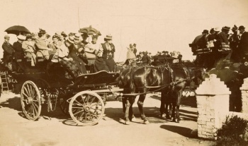 Charabancs on an outing for a large party gather at Plemont