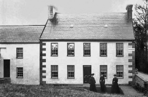 The Bisson family home, Les Fougeres, St John in about 1900. In the picture are Oswald's mother Amelie, nee Baudains, her sister Sophie Baudains, and Oswald's older sister Rosa