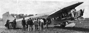 The passengers disembark from the Trimotor at Heston
