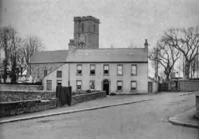 St Saviour's Hotel stood next to the parish church when Emile Guiton took this photograph in 1909, but was demolished later in the 20th century. When the hotel was demolished the lych gate was built in it place