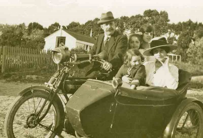 The Rimington family with Jimmy’s motor cycle and side car in 1919