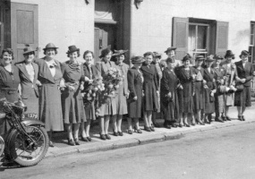 Kathleen Penney, pictured with family and friends before her wedding to a Mr Buesnel in 1942