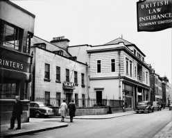 There was a YMCA hostel at 16 New Street, occupying premises owned by A de Gruchy and Co. The YMCA first came to Jersey in 1858 and moved to the New Street premises in 1909. In 1963 the organisation was given six months notice to quit the premises because the company had earmarked the area for expansion. That expansion never took place and eventually the building was given to the National Trust for Jersey, who undertook a complete renovation in the 21st century. This picture was taken in 1957.