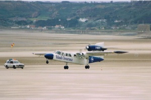 A Trislander takes off from St Aubin's Beach after an emergency landing