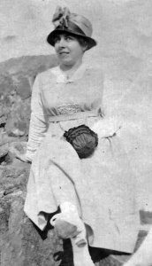 The name written on the back of this faded print is believed to be Lily Mauger, but we have not been able to identify her