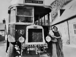 Eileen Barette, nee Amy, in front of Mont Mado Stores