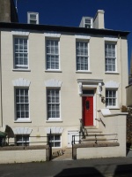 ... a short distance away in Byron Road we find two matching dormers which could not be more out of proportion with the remainder of the building, but what a frontage