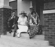 Rebecca Brooks, nee Malzard, second left, with her husband Eddie, left, and friends